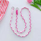 Pink woven rope phone strap - stylish and durable for secure phone carrying