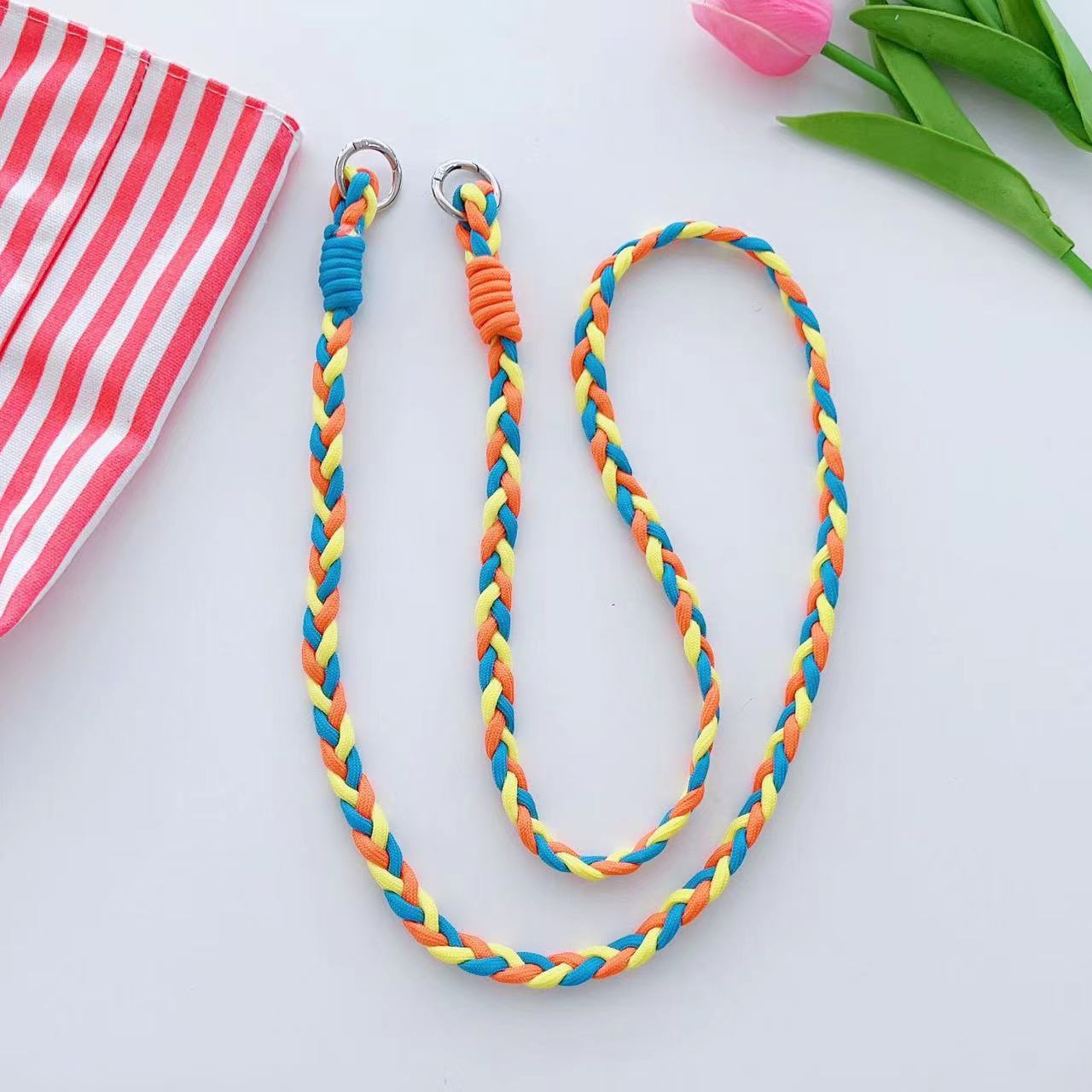 Yellow woven rope phone strap - trendy and functional for mobile devices