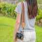 Orange cotton and faux leather camera strap - stylish adjustable shoulder sling for SLR cameras"
