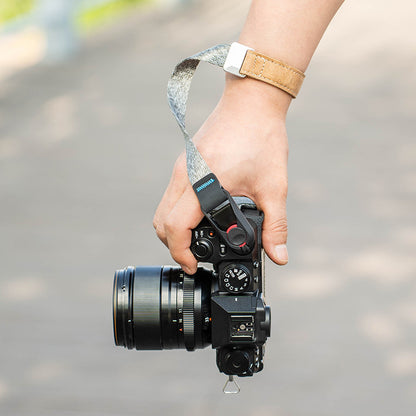 Gray adjustable camera wrist strap - high durability for sports cameras