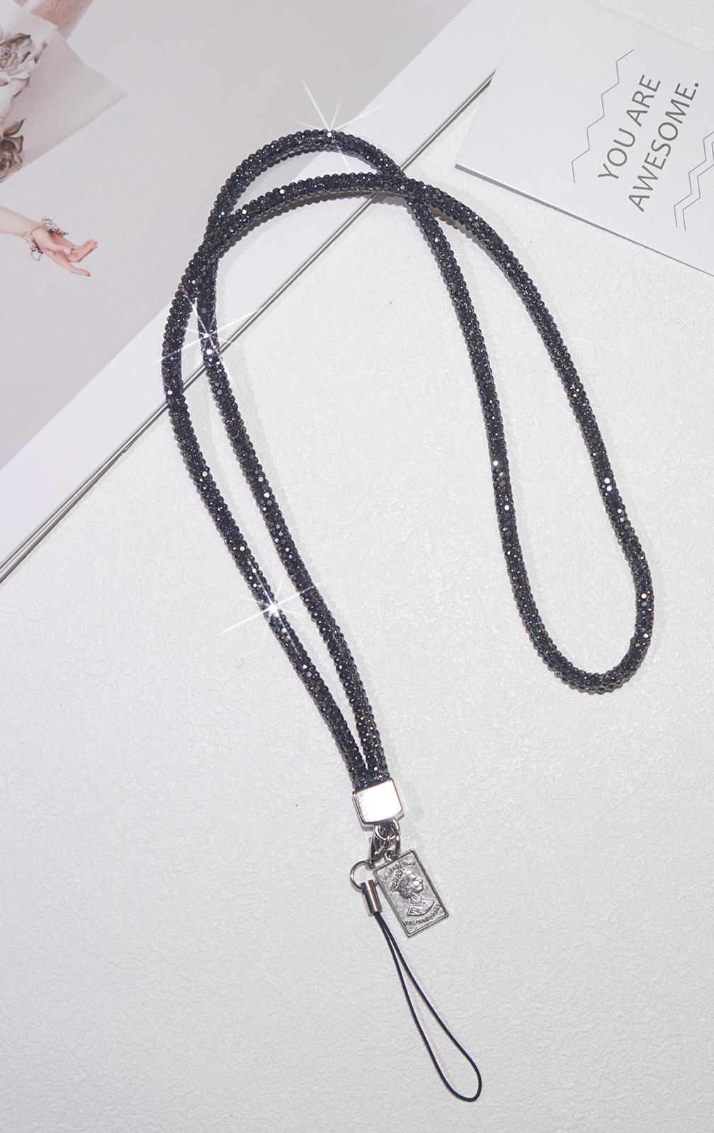 Sophisticated gray long mobile phone lanyard featuring shimmering rhinestones and diamond accents