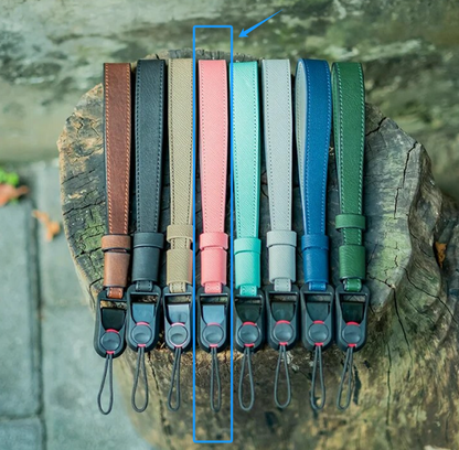 Pink cotton and leather wrist strap for SLR cameras - compact and stylish